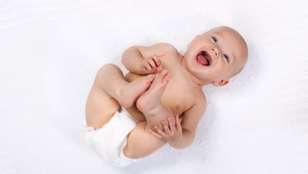 Baby poept in zijn slaap